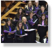 Four pictures of a performance at Quarr Abbey