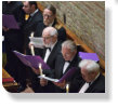 Four pictures of a performance at Quarr Abbey